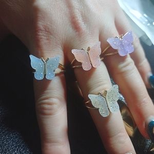 Four iridescent pastel butterfly rings 🦋